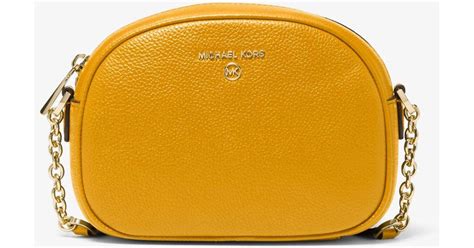 michael kors handbag charm medallion|Michael Kors jet set charm.